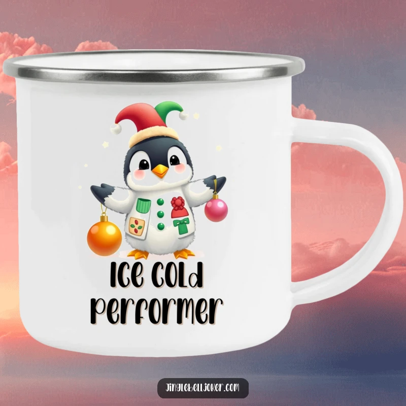 Funny camping mug with a fluffy penguin in a jester hat juggling Christmas baubles, ready for adventures and bringing holiday humor.