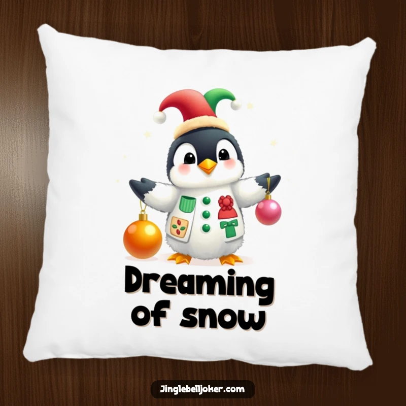 Funny pillow showcasing a fluffy penguin in a jester hat juggling festive Christmas baubles, bringing soft holiday humor and cheer.