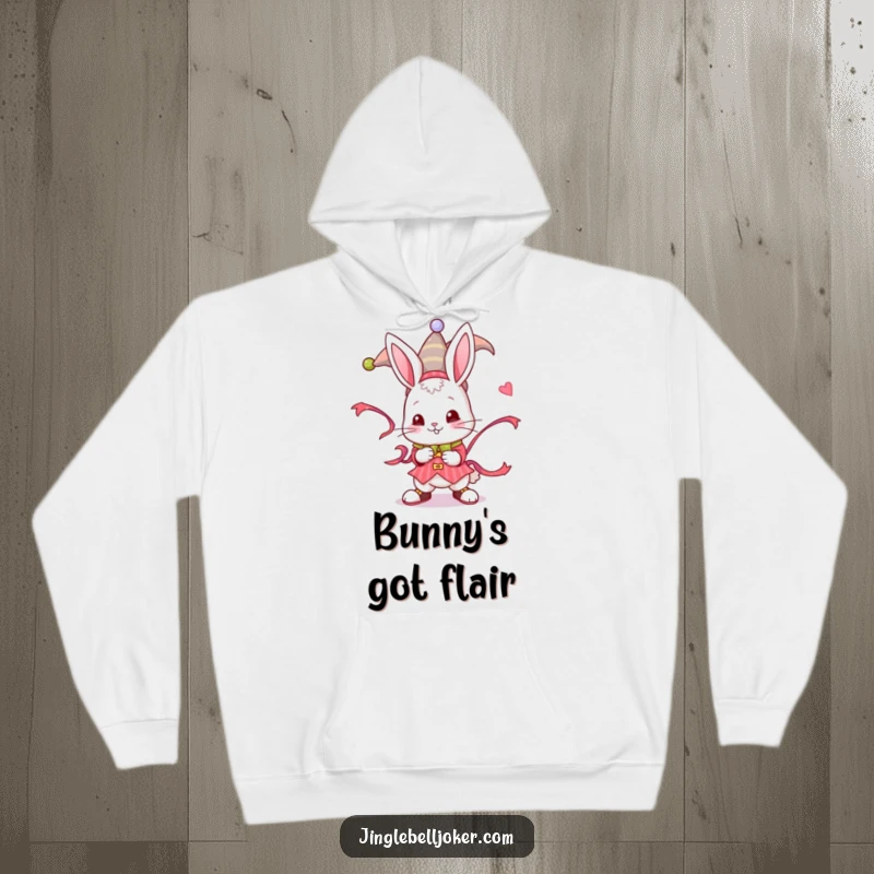 Funny Jester Bunny Hoodie: A sweet bunny as a jester twists a festive ribbon, great for cozy, fun days.