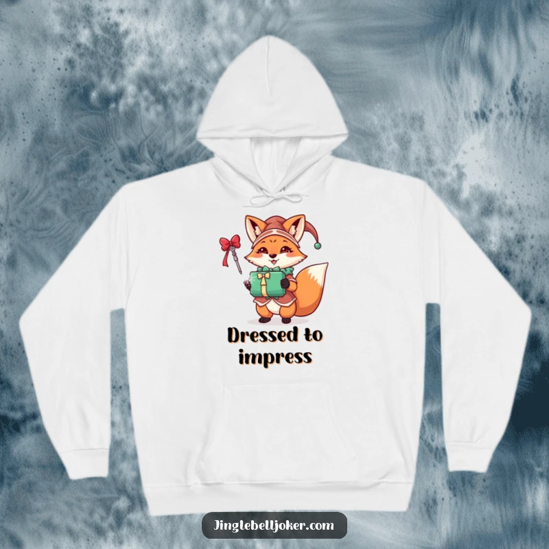Funny fox jester hoodie showing a festive character in jester attire holding a sparkling gift, perfect for holiday warmth.