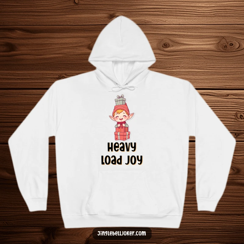 Funny hoodie with a giggling elf character humorously balancing a stack of presents on its head, perfect for cozy holiday fun.