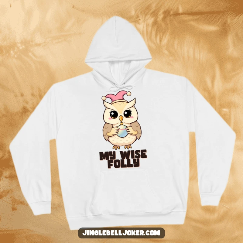 Funny hoodie with a whimsical owl in a jester cap holding a shiny bauble, perfect for comfort.