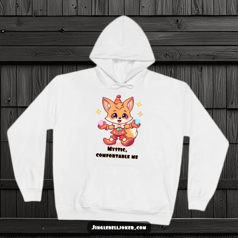 Funny Fox Jester Hoodie: Cheerful fox with jester shoes, juggling glowing orbs, cozy magical comfort.