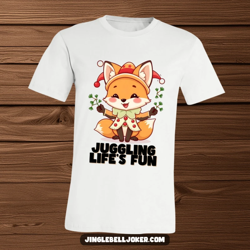 Funny Fox Jester T-Shirt, featuring a joyful fox in festive jester attire, expertly juggling mistletoe sprigs, ideal for holiday humor.
